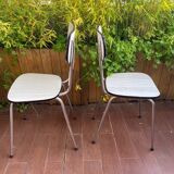 Pair of white formica chairs and stool