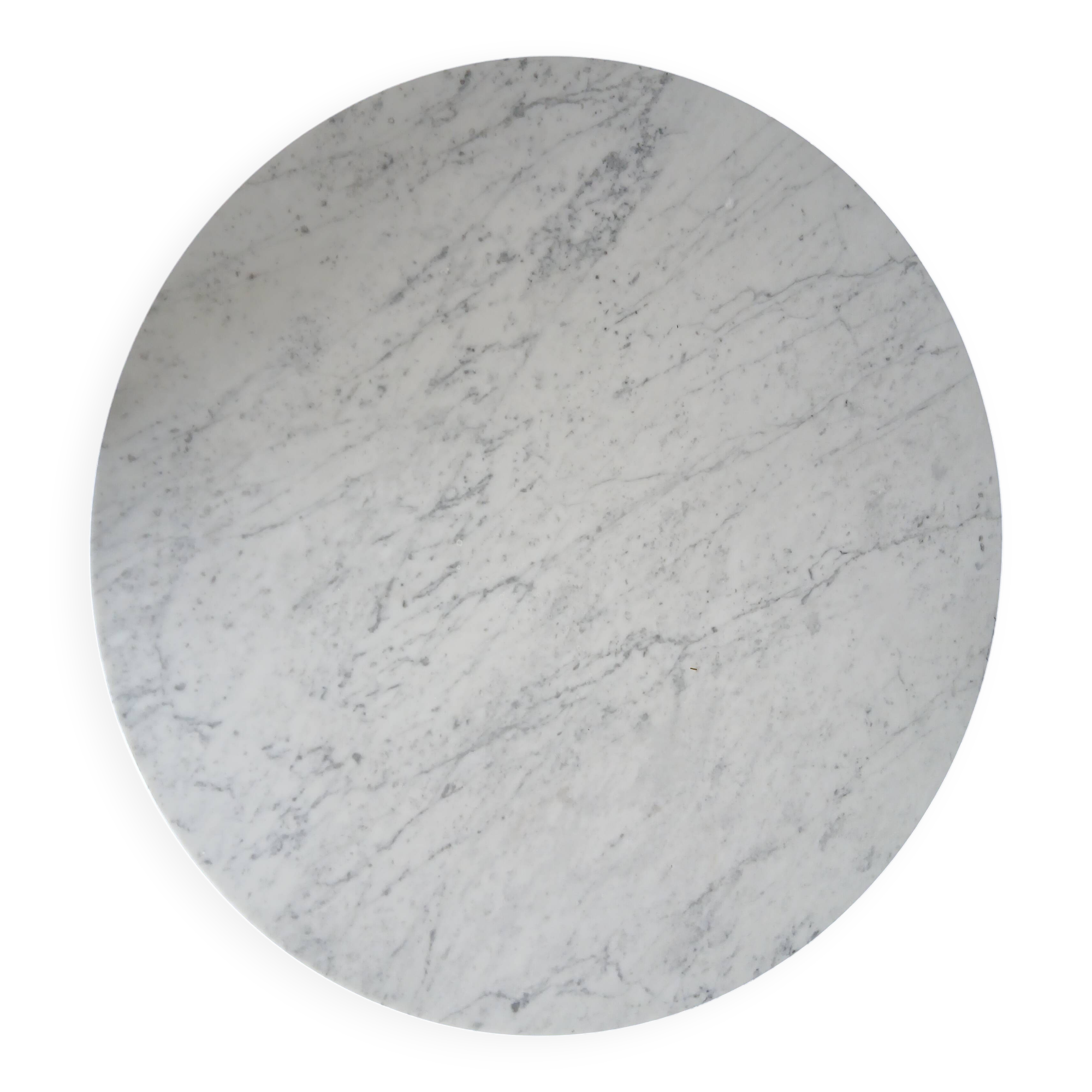 Round marble coffee table with tulip base.