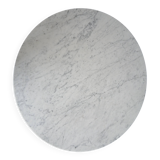 Round marble coffee table with tulip base.