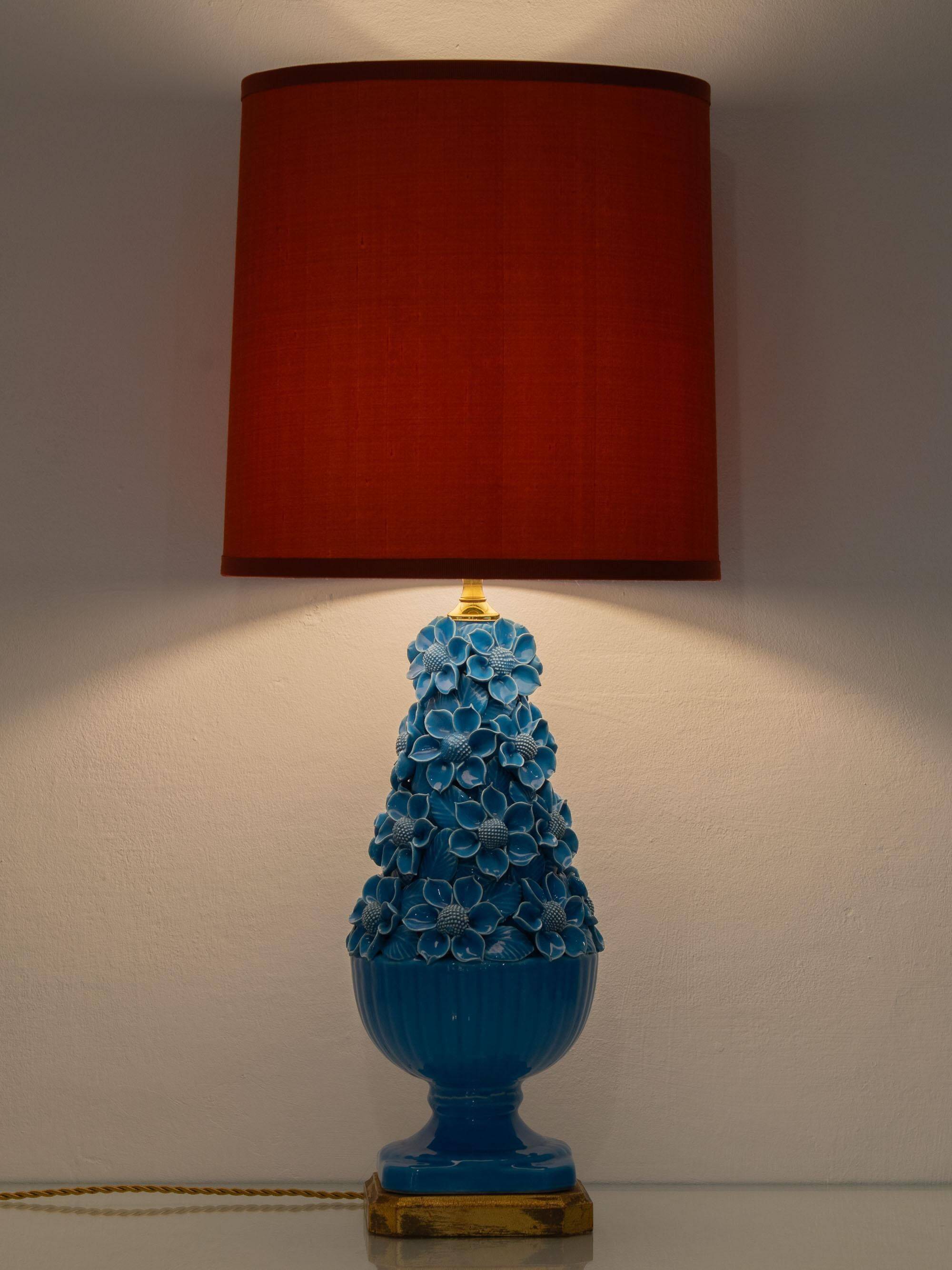 Turquoise glazed ceramic floral table lamp from Manises mid-century, with a new silk shade.