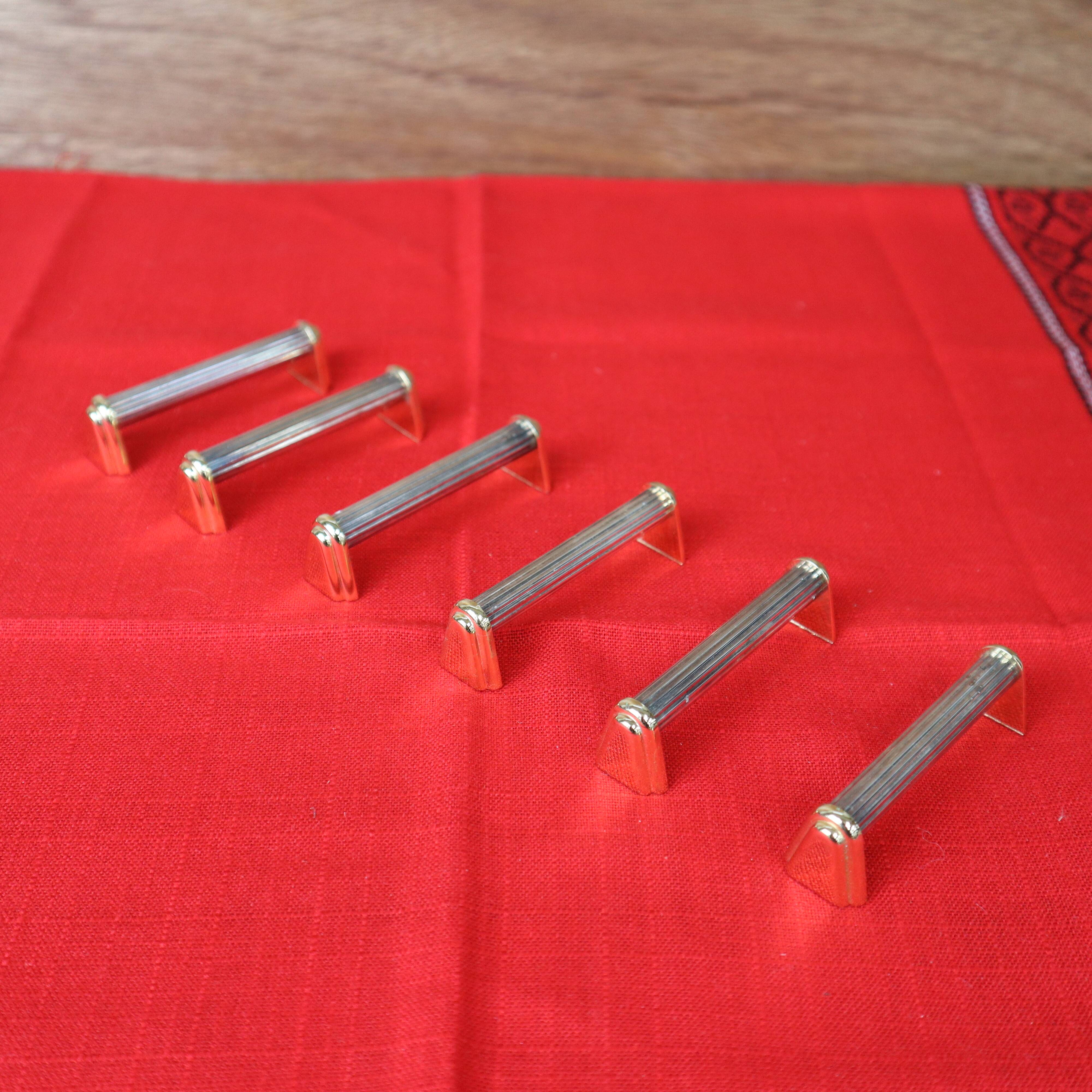 Set of 6 silver and gold metal knife holders