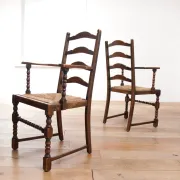 Pair of English oak armchairs with ladder back and rush seats