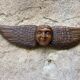 Carved wooden angel head