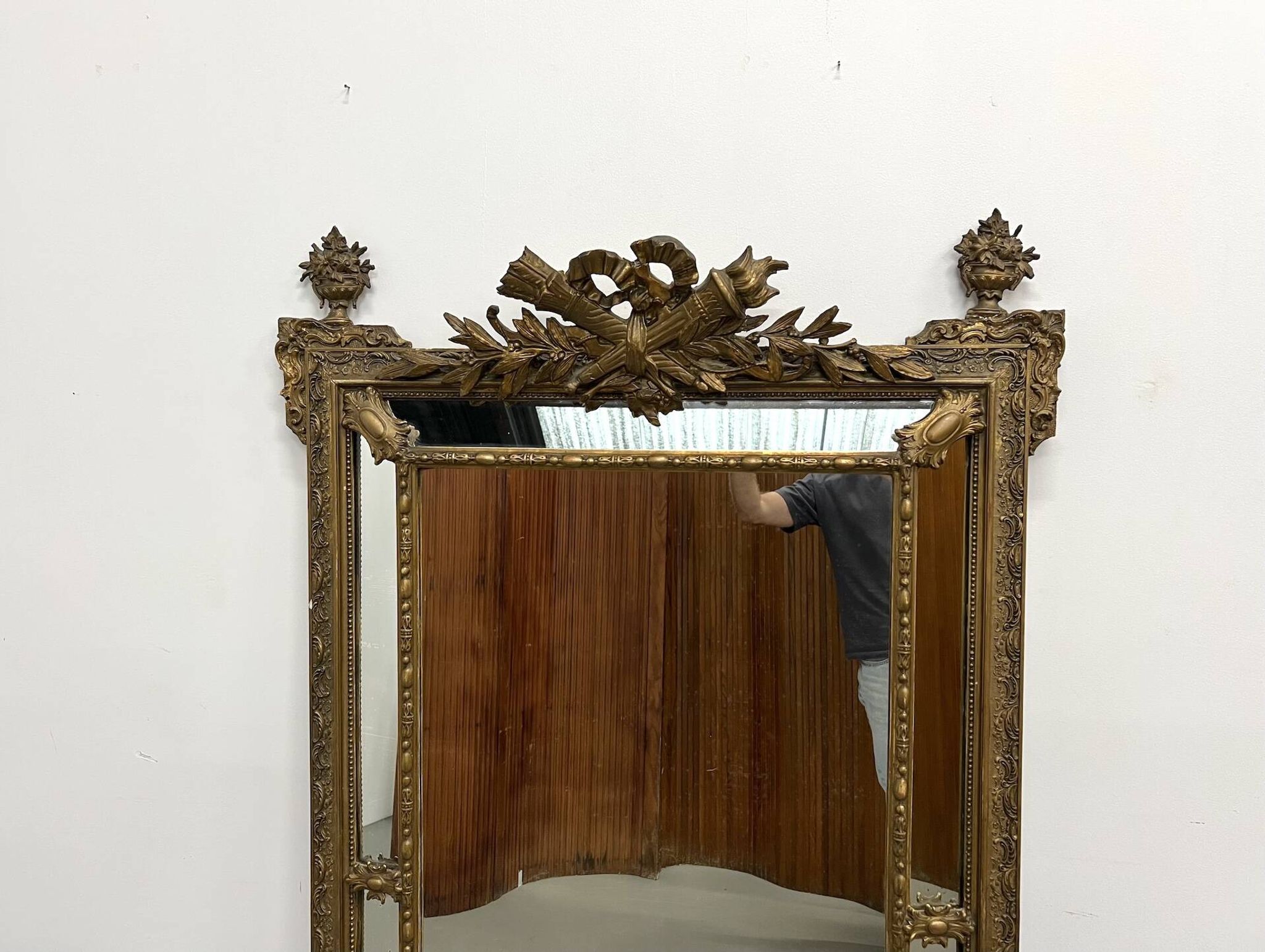Large antique pediment mirror with mouldings.