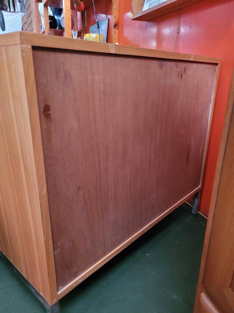 Solid wood chest of drawers with chrome legs from the 1970s.