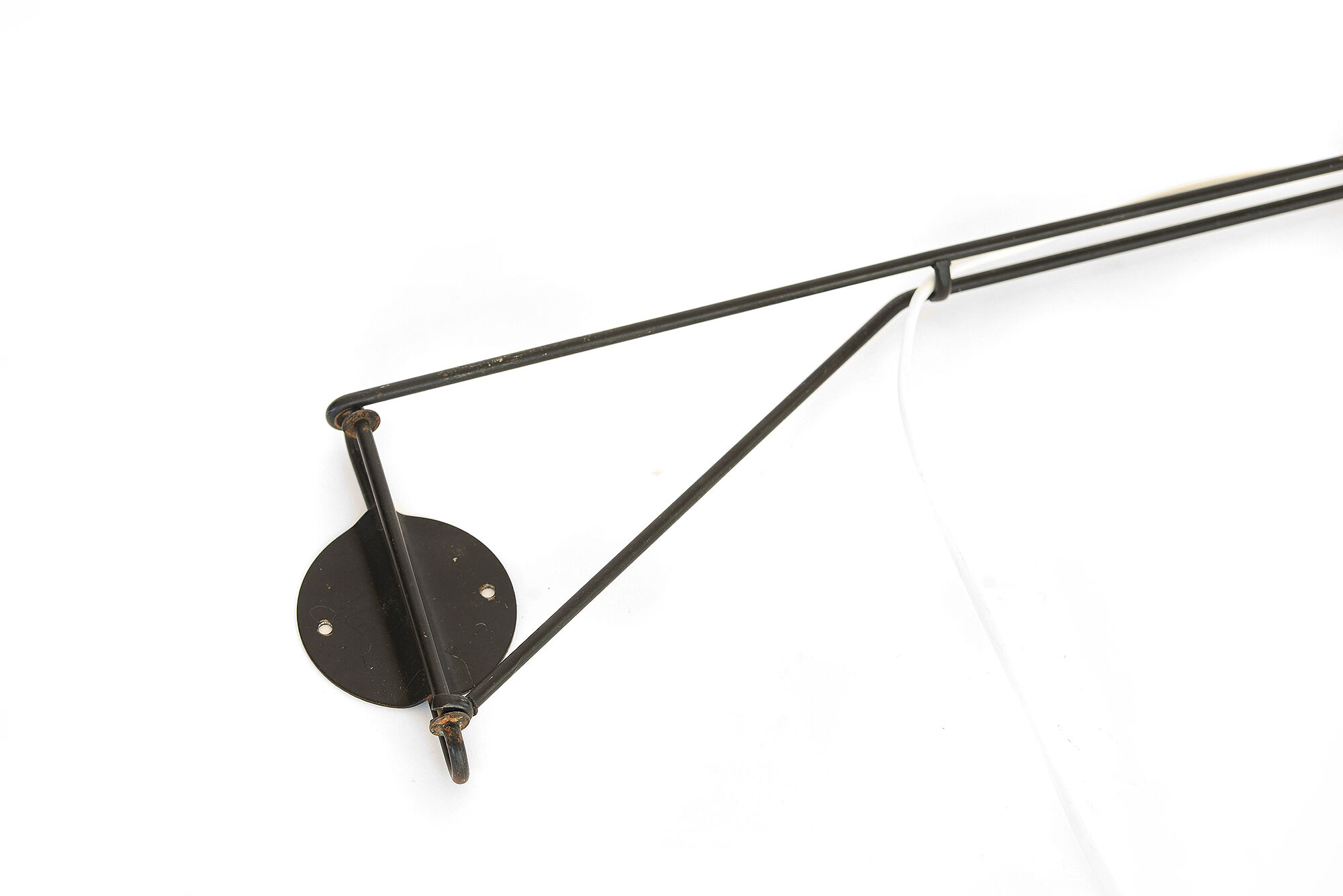 Adjustable "string" type wall light with green original shade.