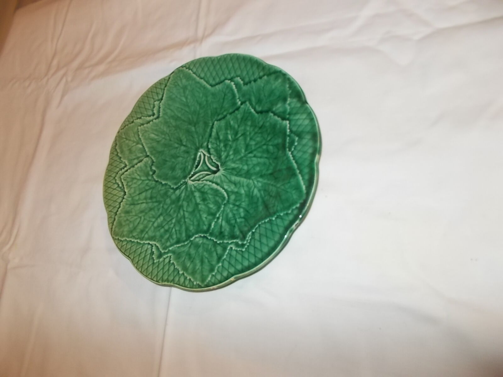 Bowl with green vine leaves