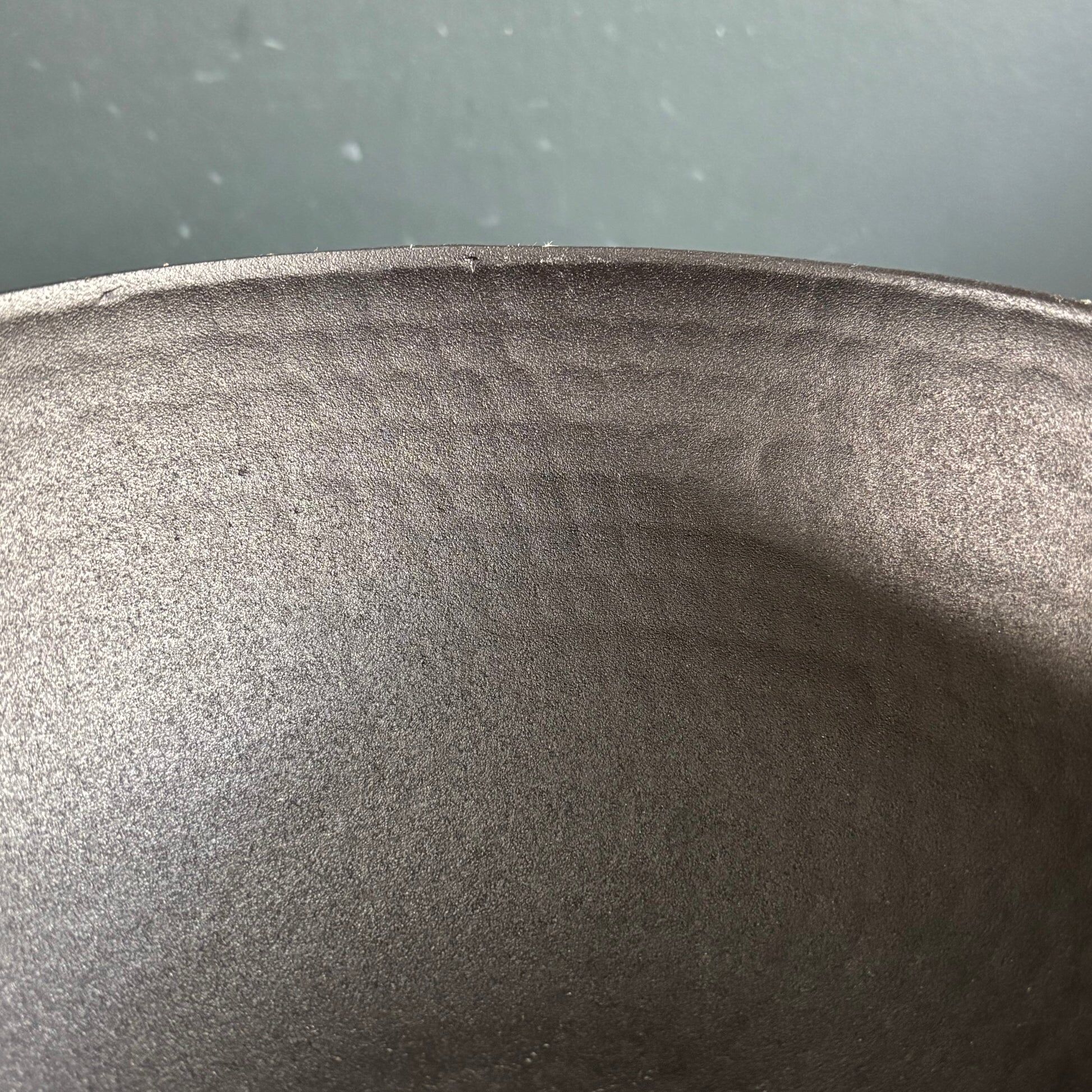 Pair of black lacquered metal catchall bowls