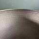 Pair of black lacquered metal catchall bowls
