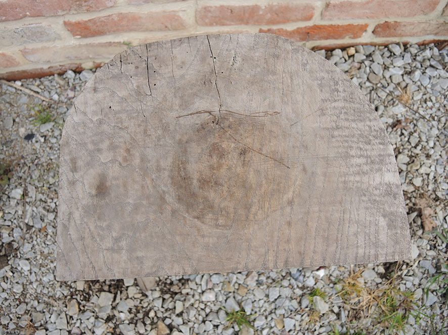 Old raw wood milking stool