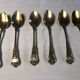 Vermeil (gilded silver) spoons in black wooden box