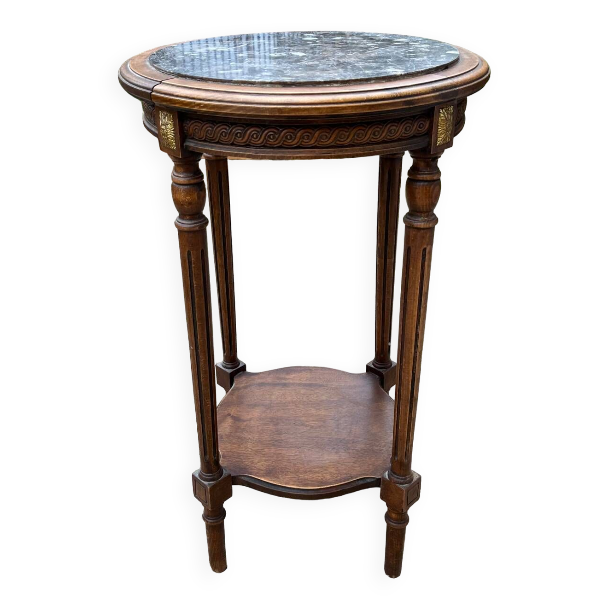 Old wooden pedestal table with marble top