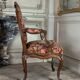 Louis XV armchair in carved walnut, needlepoint tapestry, 18th century