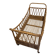 Vintage rattan baby cot on wheels.