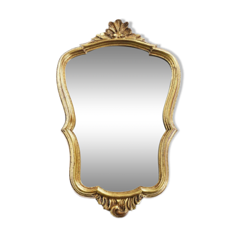 Miroir en bois doré style baroque.