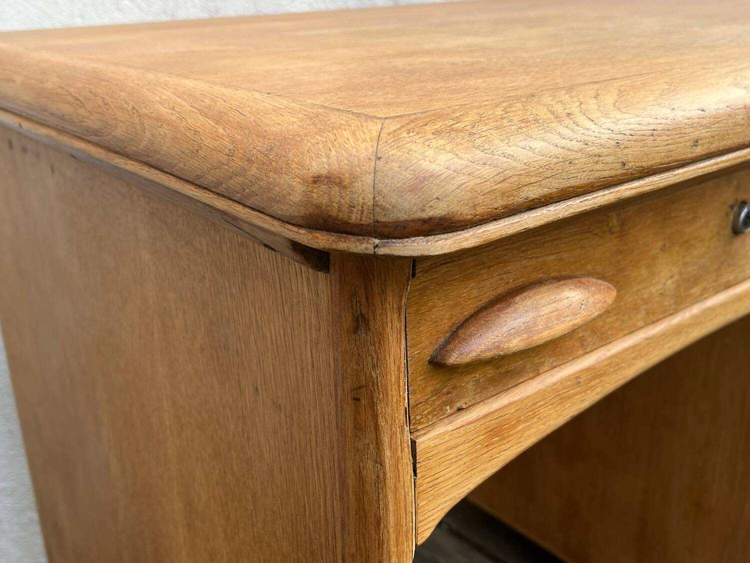 Antique light oak desk from the 1950s with 4 drawers