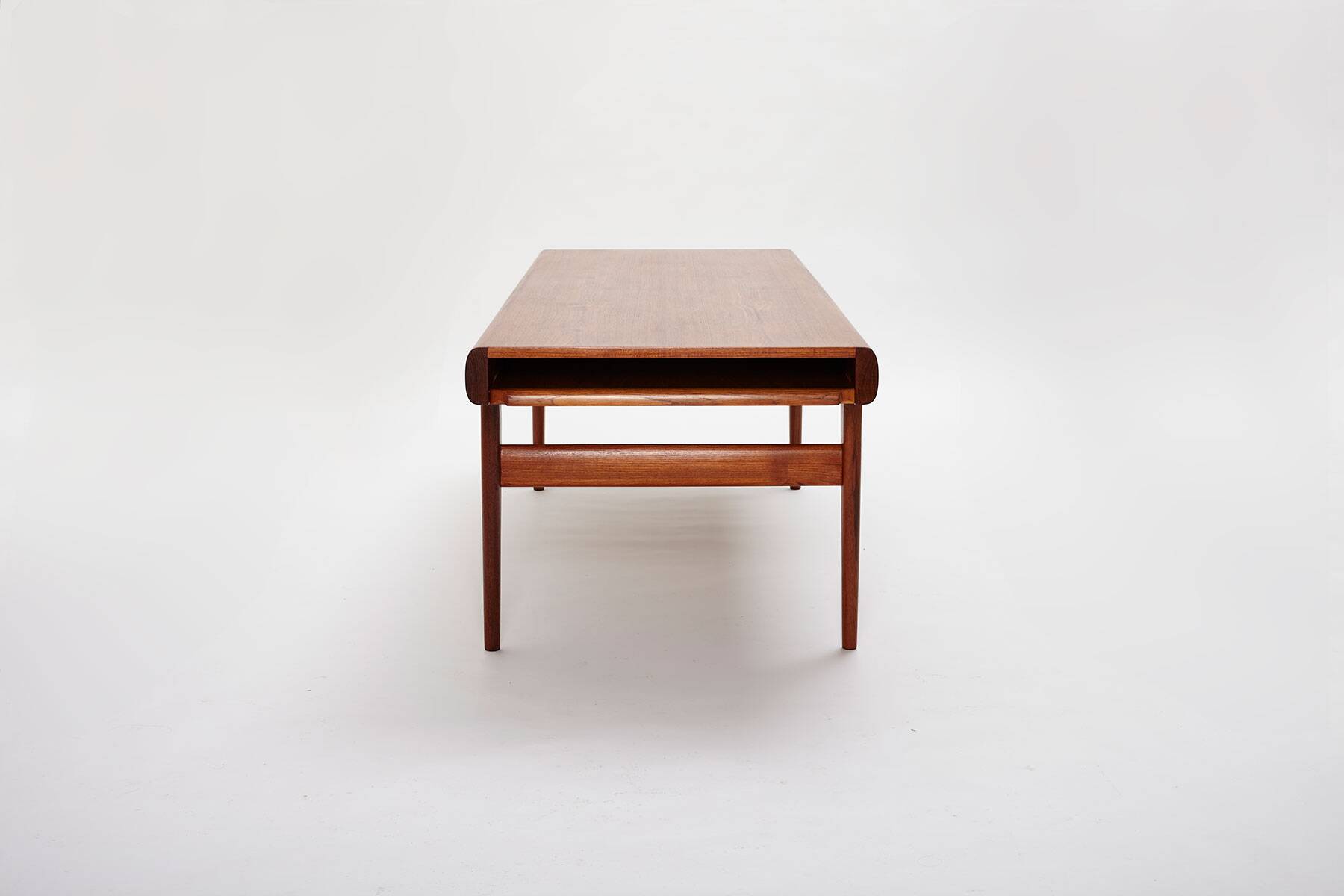 Extendable coffee table designed by Johannes Andersen for Uldum Møbelfabrik, Denmark, 1960s.