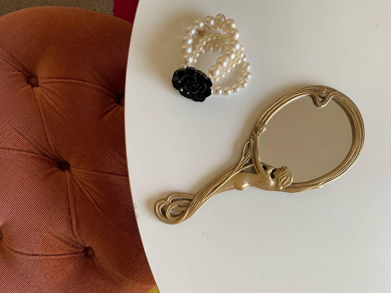 Art Nouveau brass mirror for women