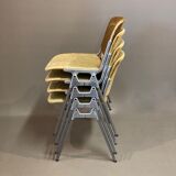Suite of 4 chairs by Giancarlo Piretti