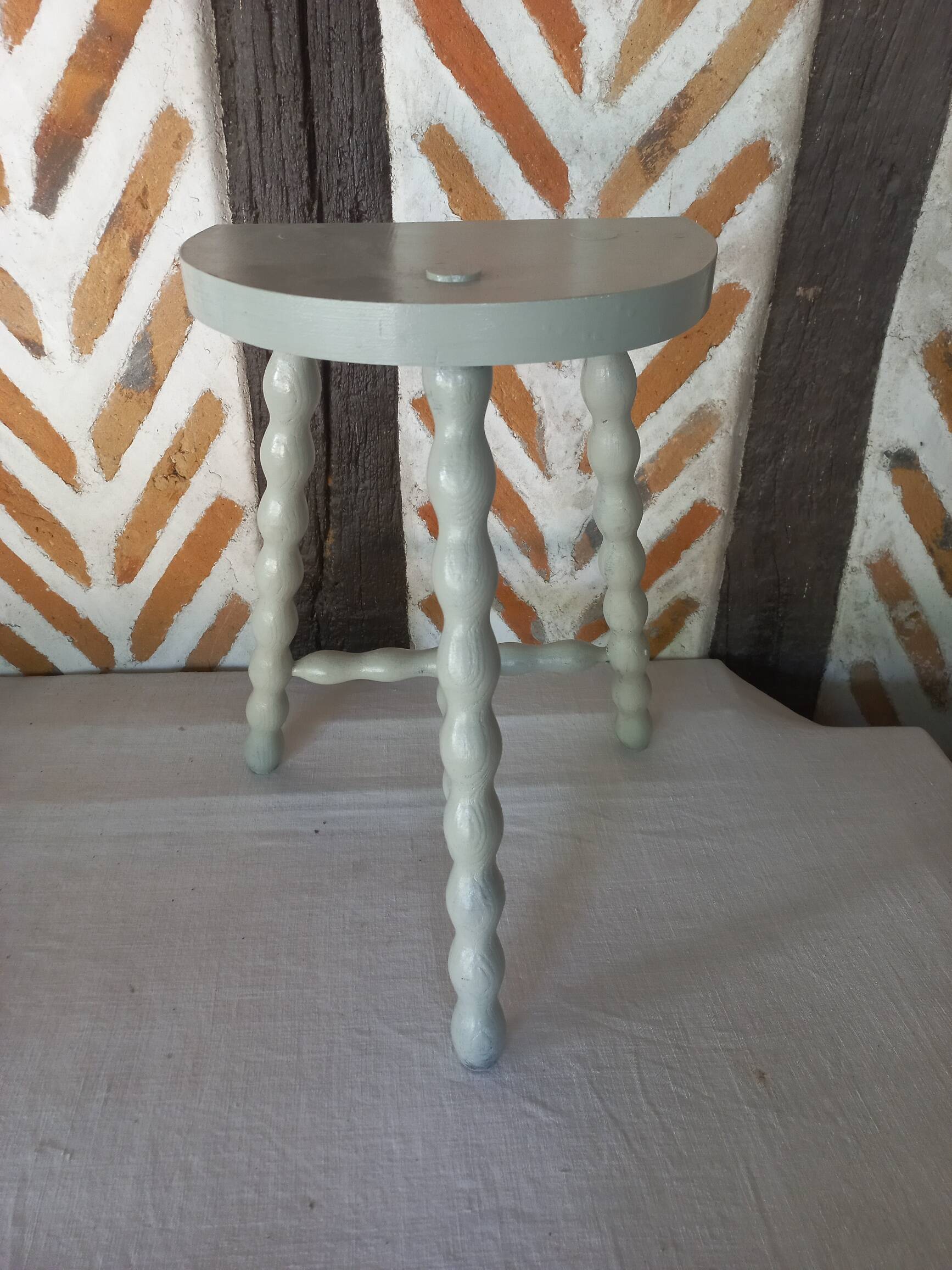 Light gray green tripod stool 1960