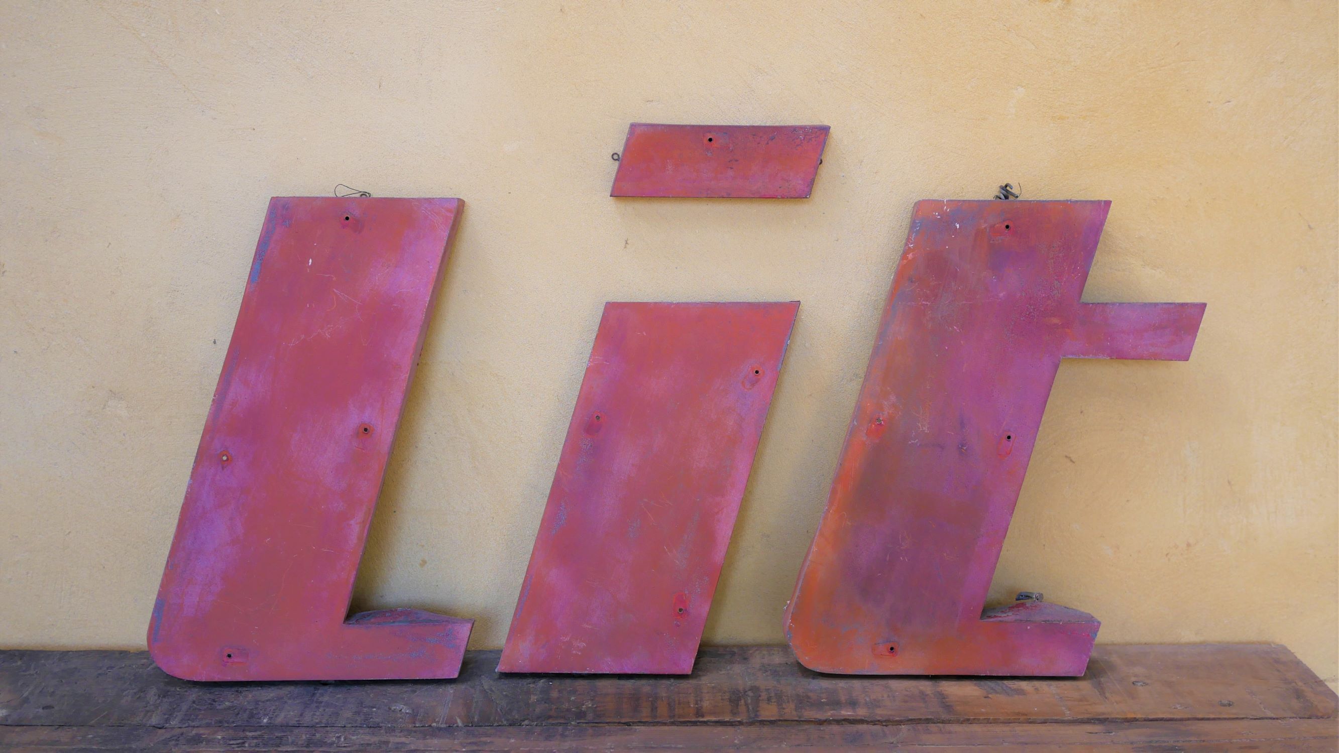 Letter to sign vintage metal "T".