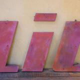 Letter to sign vintage metal "T".