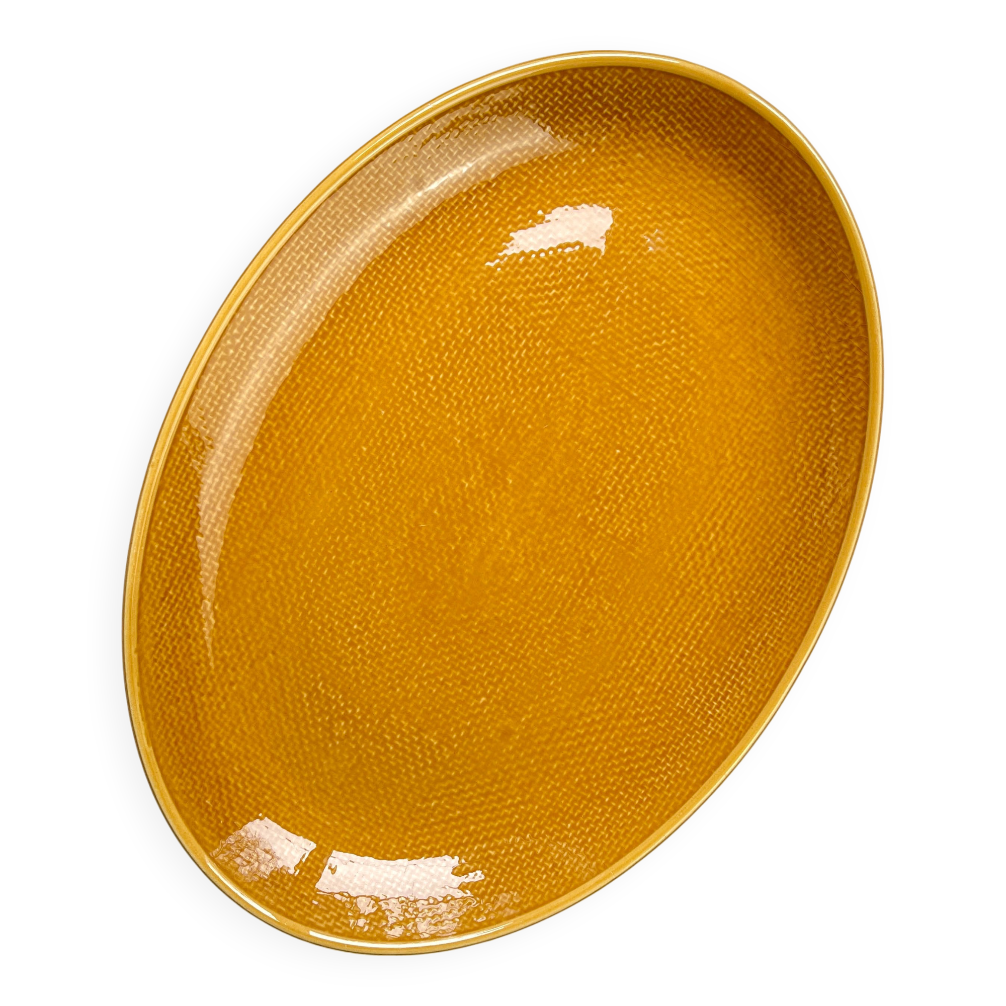 Vintage oval dish in ochre French earthenware from the 70s