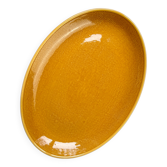 Vintage oval dish in ochre French earthenware from the 70s