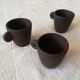 Set of three matte brown ceramic cups for dolls' play kitchen