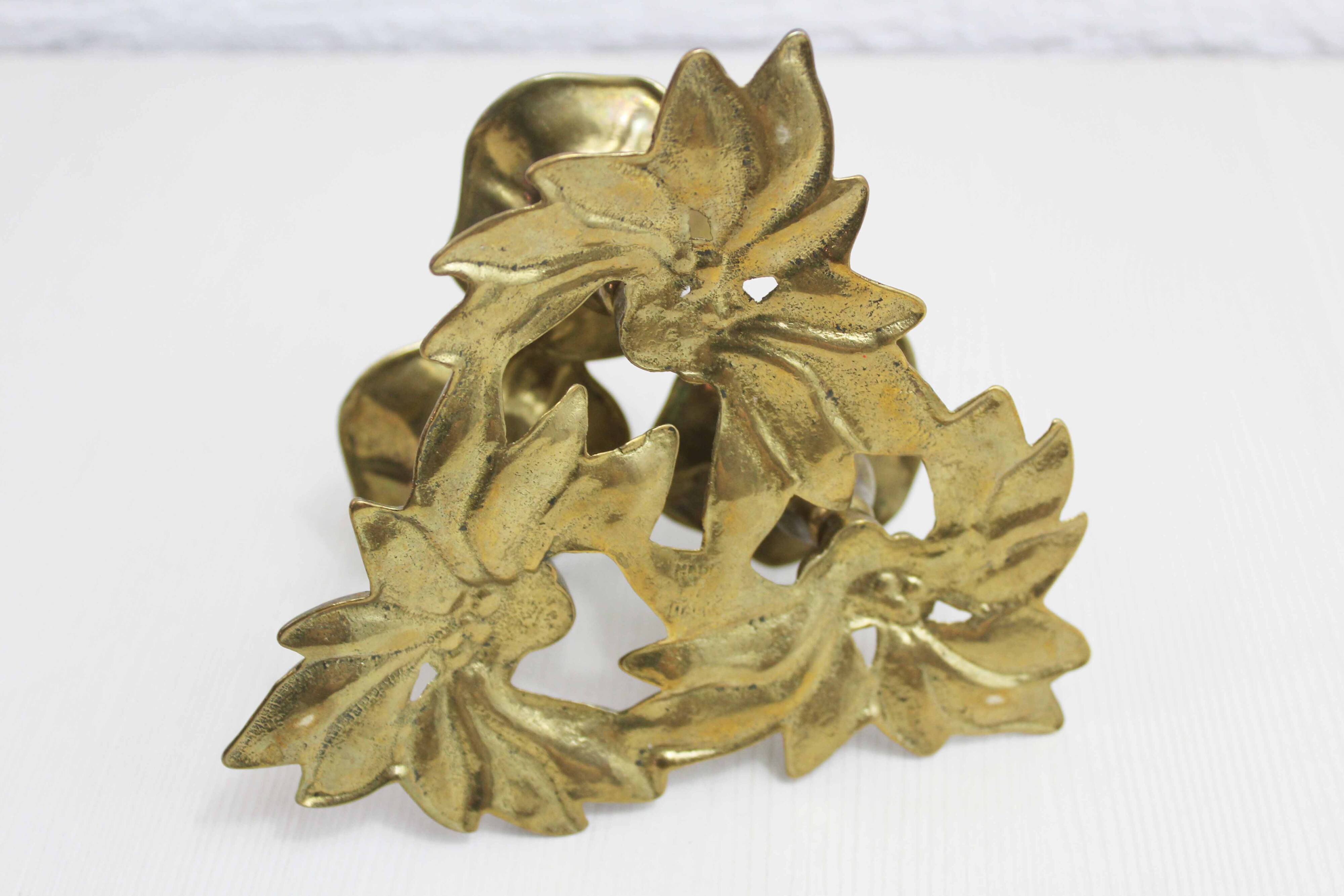 Brass flower candle holder