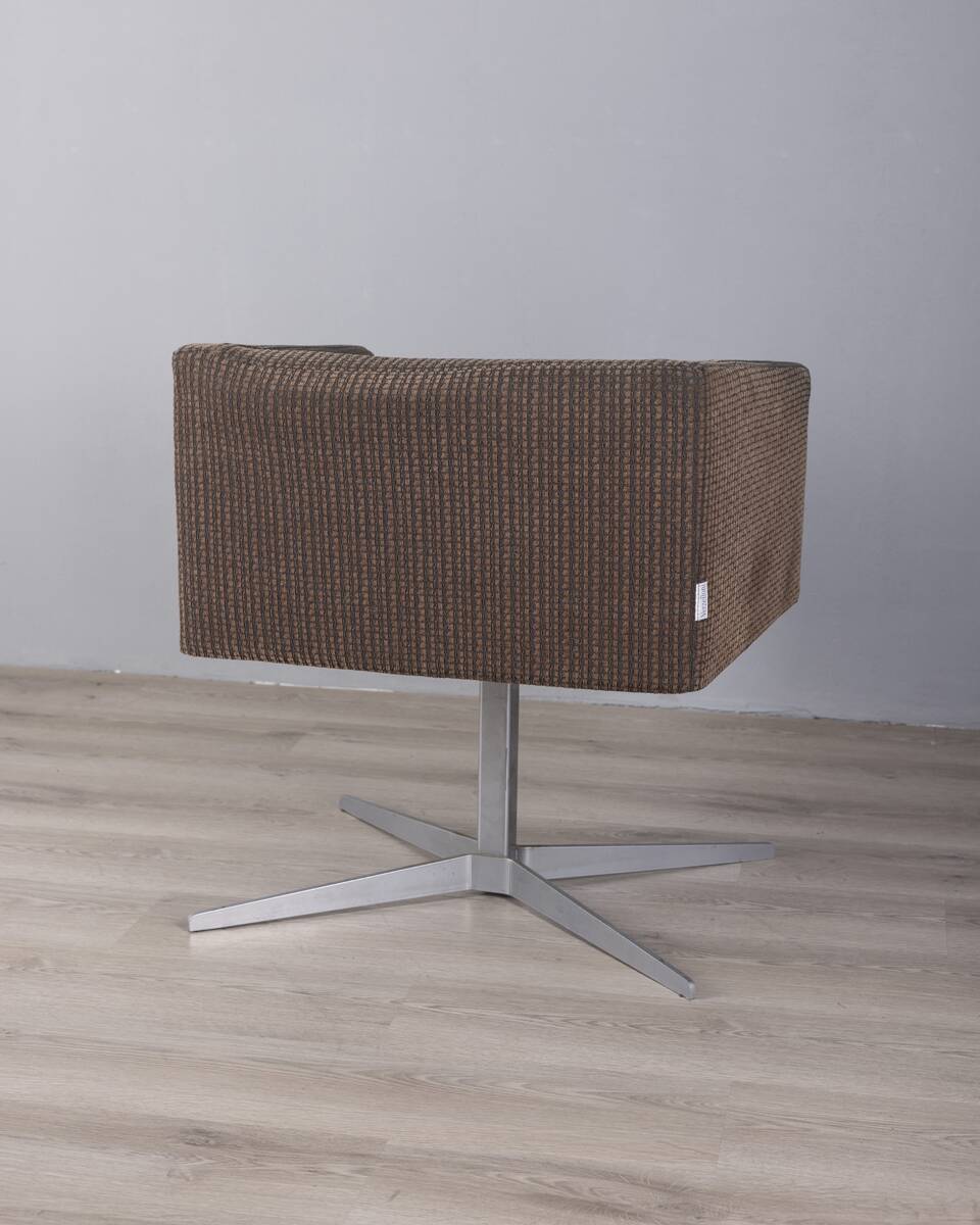 "Cubica" metal and fabric swivel armchair designed by Verzelloni