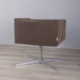 "Cubica" metal and fabric swivel armchair designed by Verzelloni