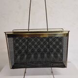 Vintage gold magazine rack from the 1960s.
