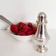 Silver-plated sugar shaker with fluted edges