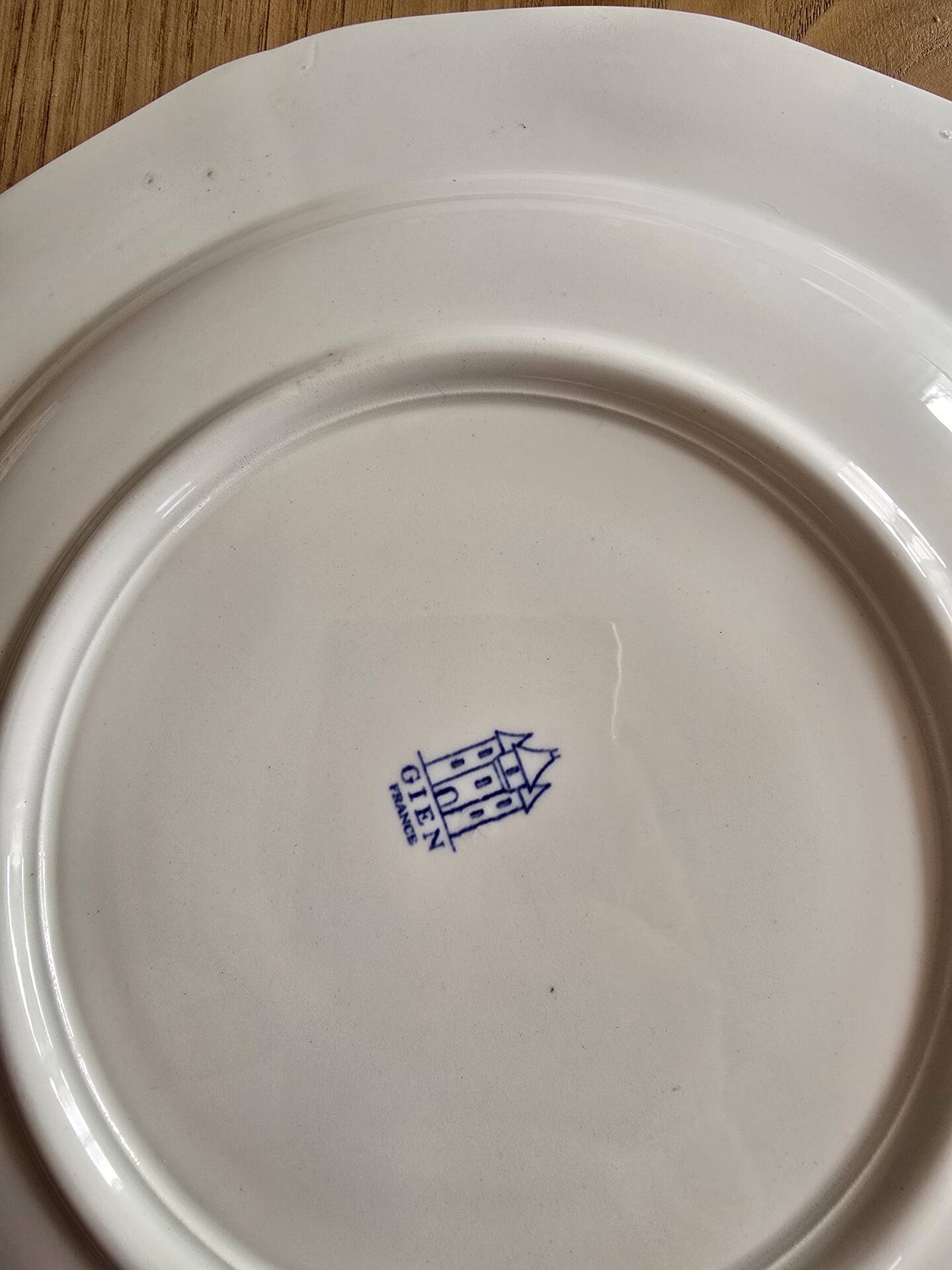 Gien service plates with blue patterns in perfect condition.