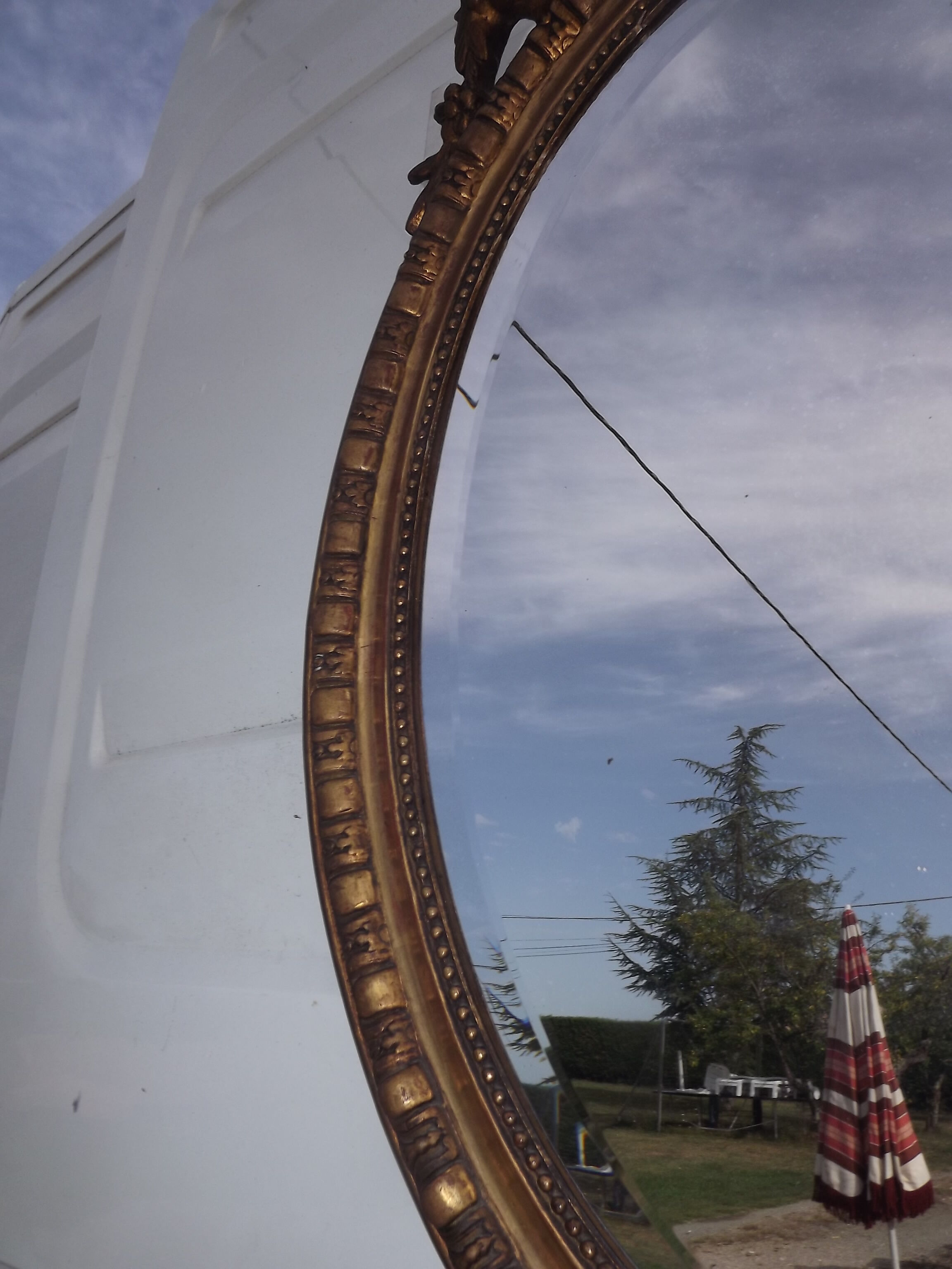 Mirror 19th wood and stuk golden oval 97x62cm