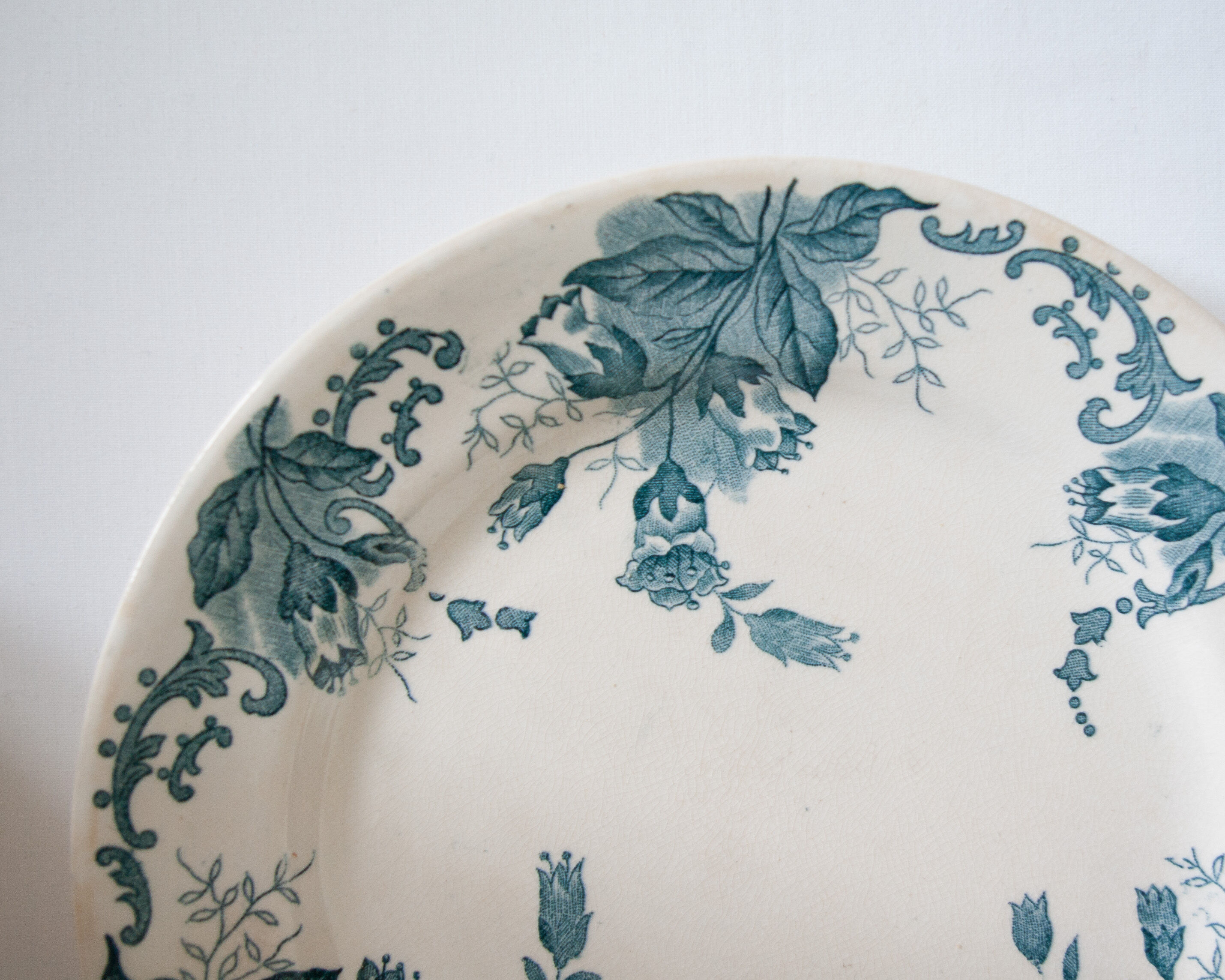 Pair of old flowered plates