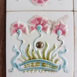 Antique earthenware and wood trivet