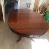 Round mahogany dining table