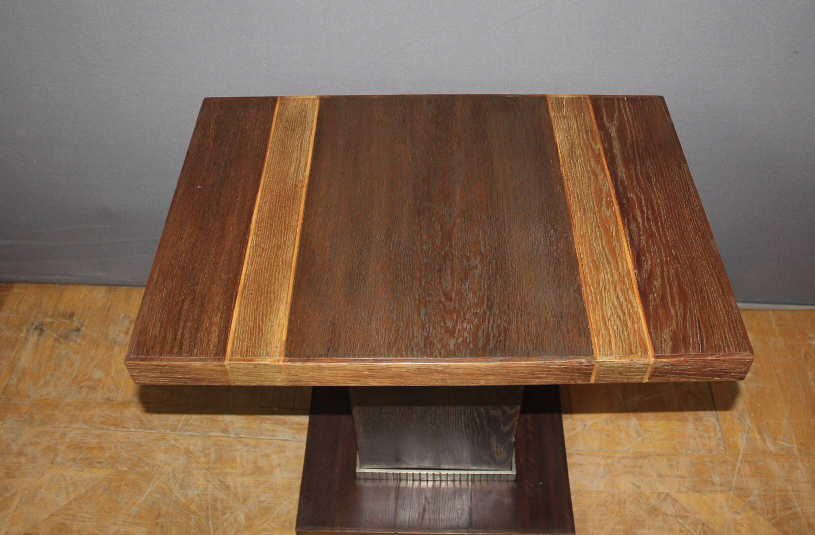 Art Deco period pedestal table in oak and nickel-plated bronze circa 1930