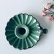 Old antique olive green enamelled metal candlestick