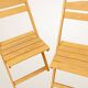 Paire de chaises pliantes en bois blond