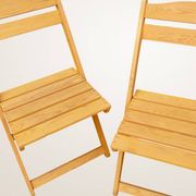 Paire de chaises pliantes en bois blond