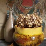 Old provencal pot cover in glazed terracotta