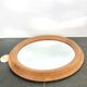 Oval wooden mirror 31x37cm