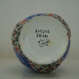 Piriform vase with a flared metal collar enamelled with a polychrome decoration, marked "Amini Iran" on the reverse.