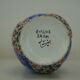 Piriform vase with a flared metal collar enamelled with a polychrome decoration, marked "Amini Iran" on the reverse.