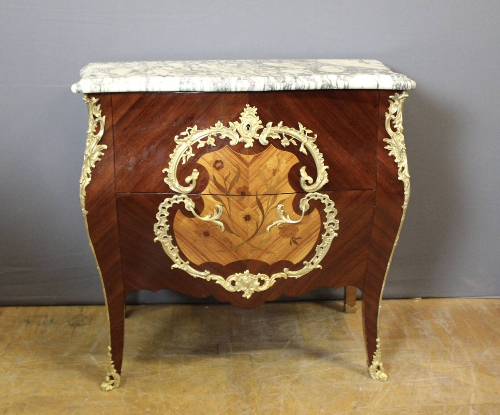 Louis XV style commode in marquetry around 1900