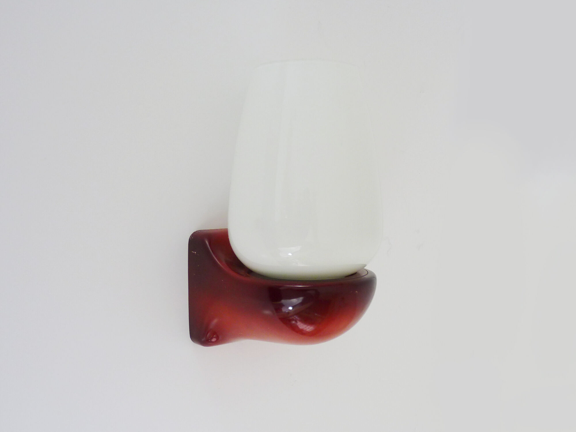 Vintage wall lamp in burgundy pvc and globe in white opaline. Year 70