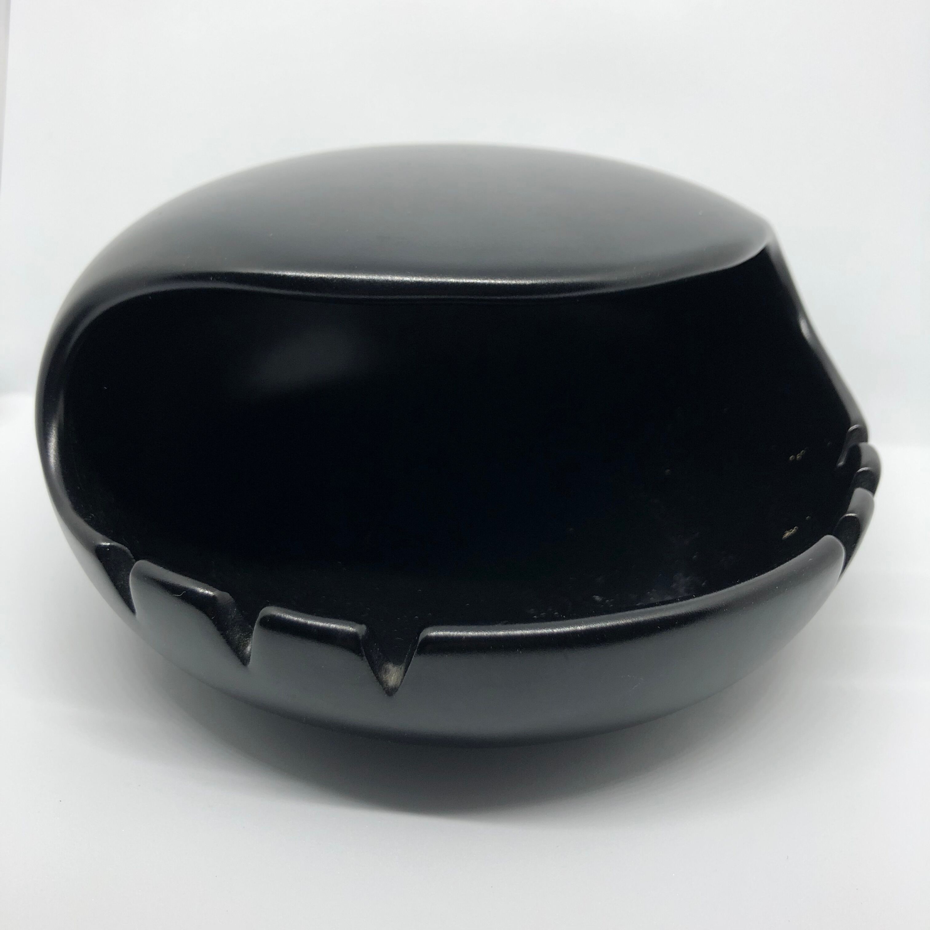 Vintage black ceramic ashtray